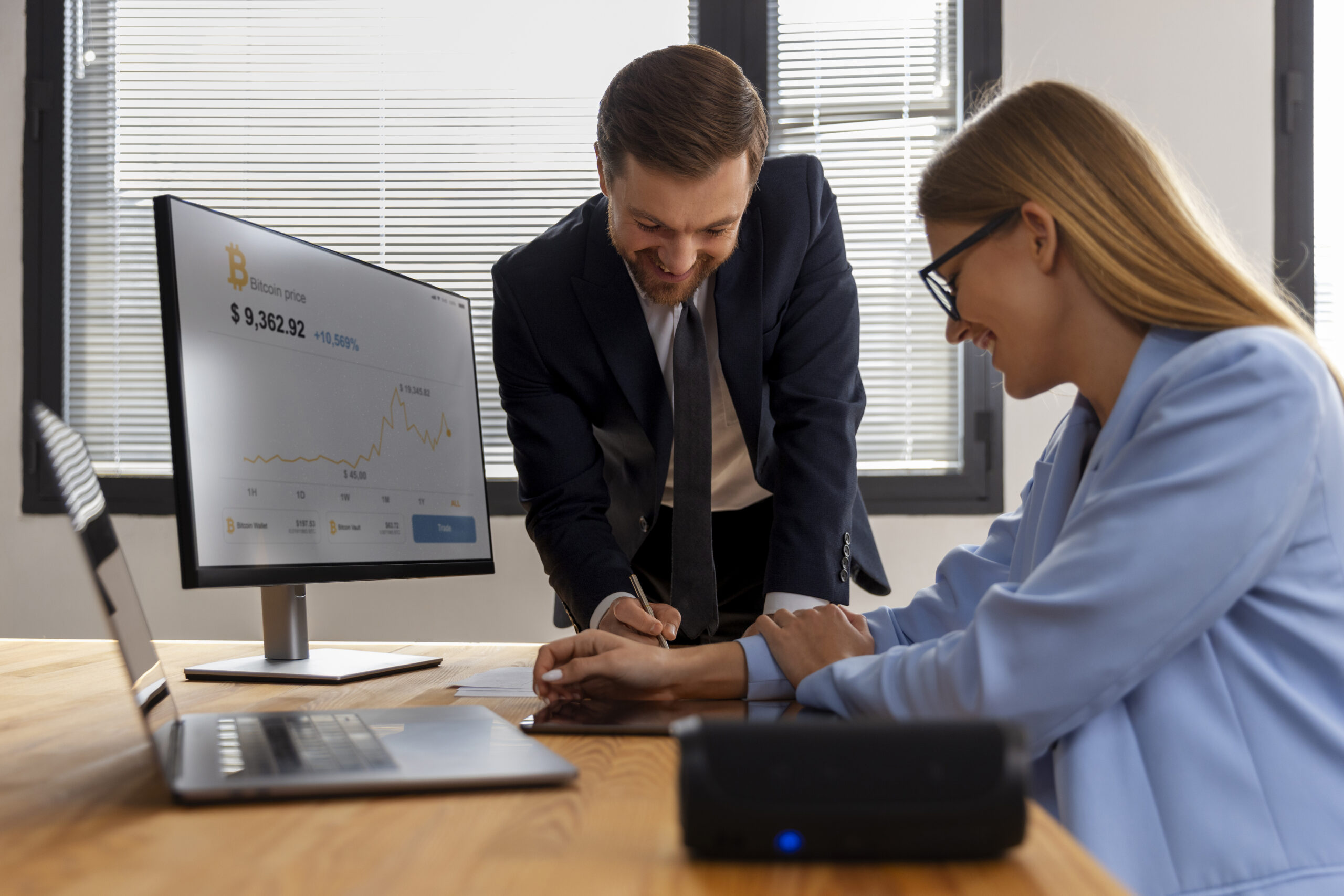 person-looking-finance-graphs
